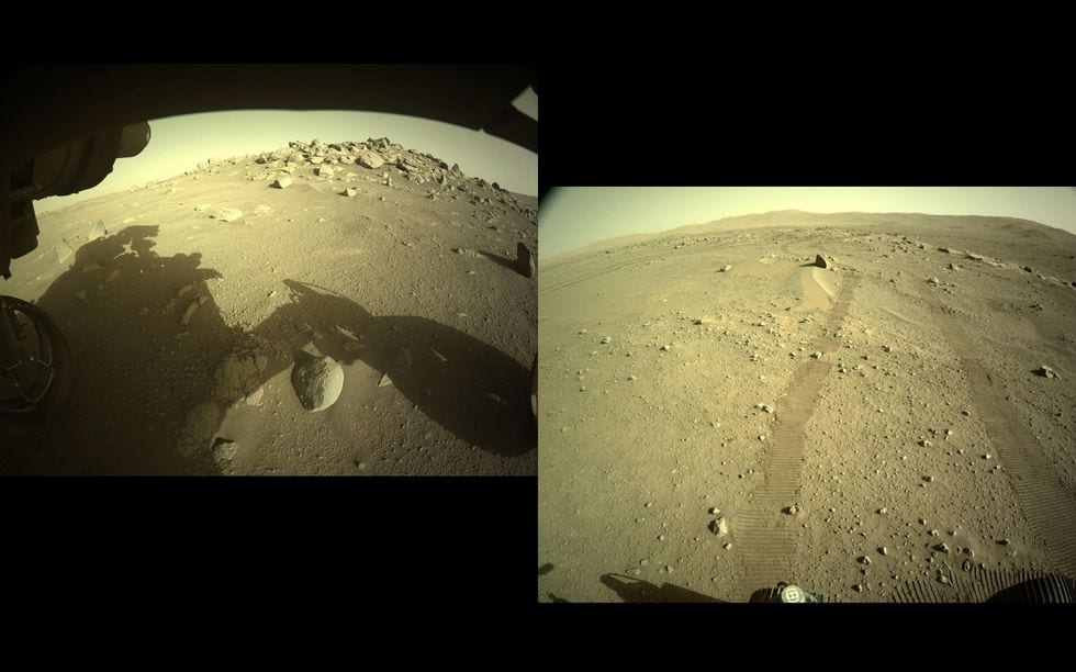 View of Mars' rocky surface as-captured by cameras installed on the undercarriage of a space rover.