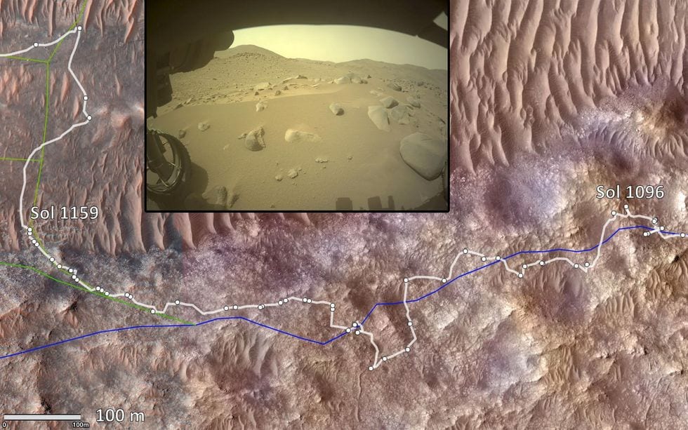 A map of Mars' surface featuring the Perseverance rover's planned path for autonomous navigation, alongside its final executed route which was diverted due to hazardous terrain.