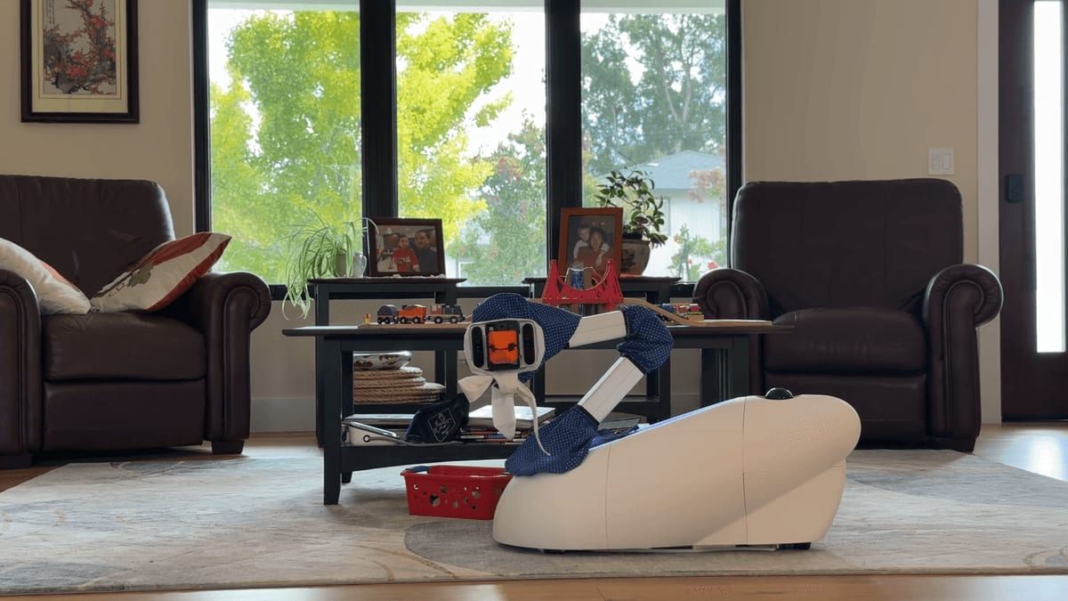 Mobile assistive robot with articulated arm beside coffee table in cozy living room