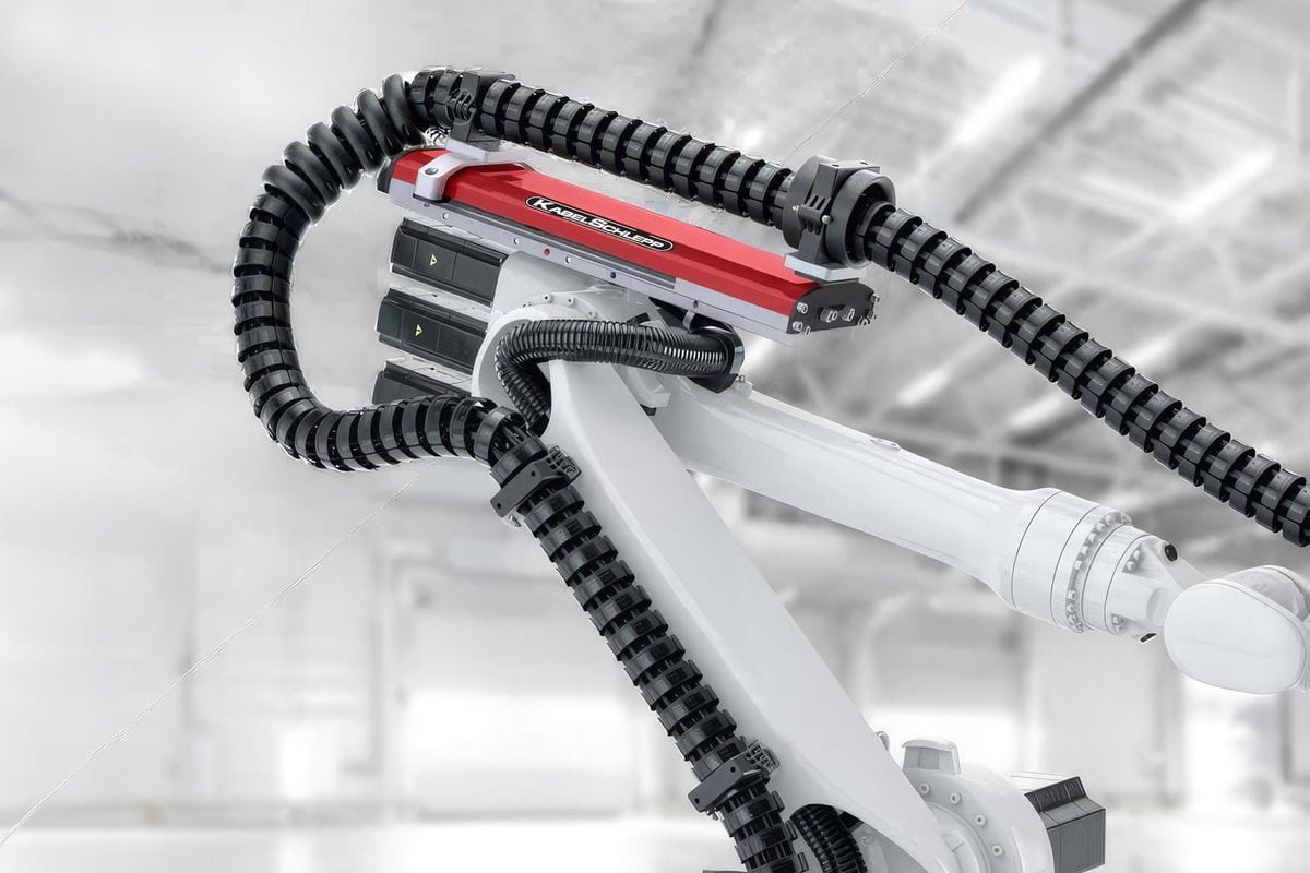 Industrial robotic arm with cable management system and flexible energy chains
