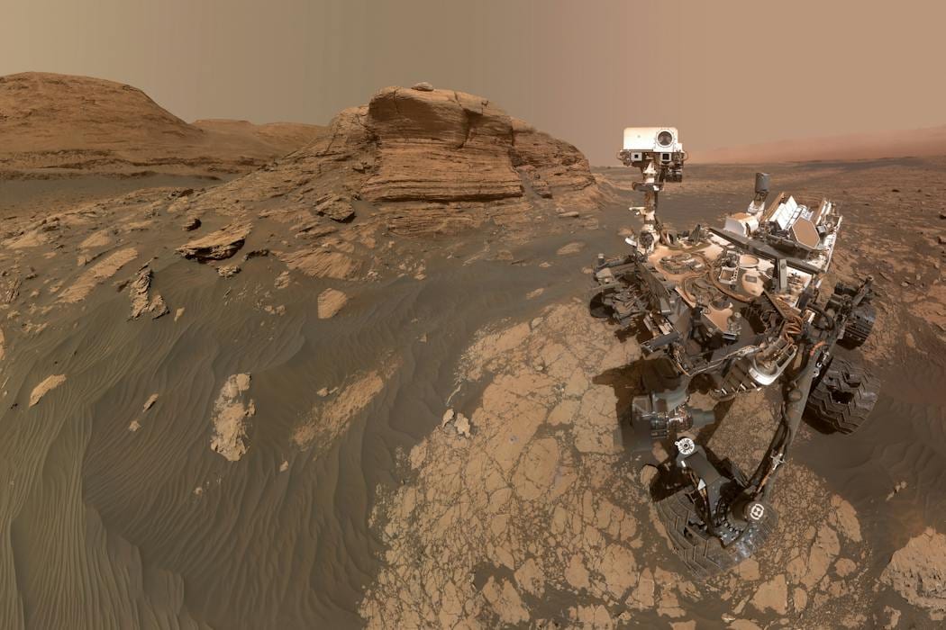 NASA’s Curiosity Mars rover used two cameras to create this selfie in front of Mont Mercou, a tall rock outcrop. NASA/JPL-Caltech/MSSS