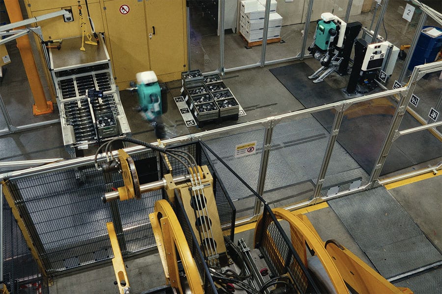 Agility's Digit 5 humanoid sits down when people approach